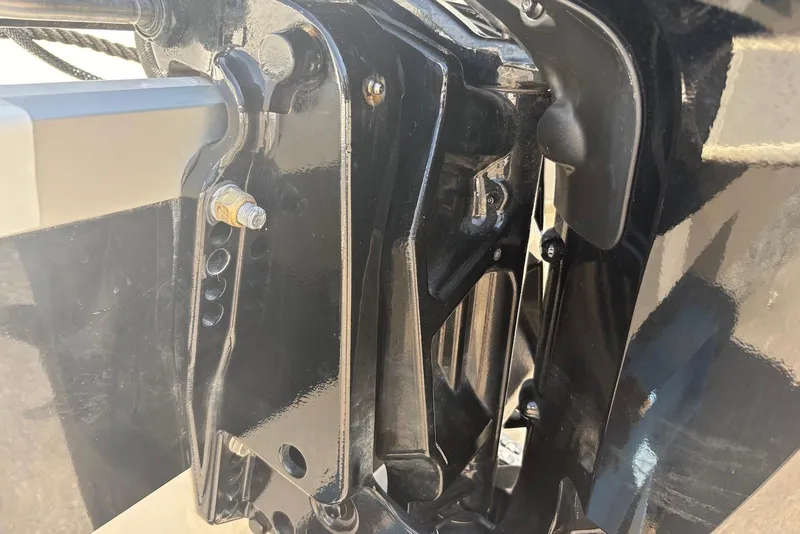 Slide: The Image of Close-up of 2023 Bayliner Element E18 boat's black metal component. - 9