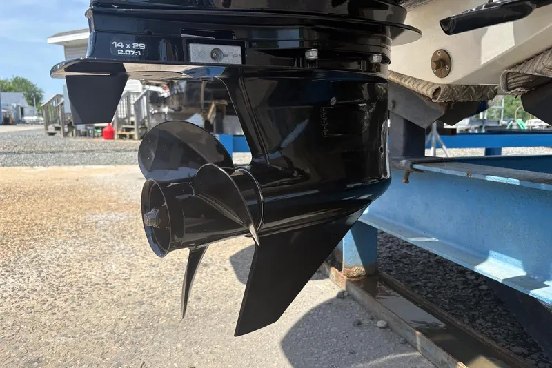 Slide: The Image of 2023 Bayliner Element E18 boat propeller on display at a marina. - 7
