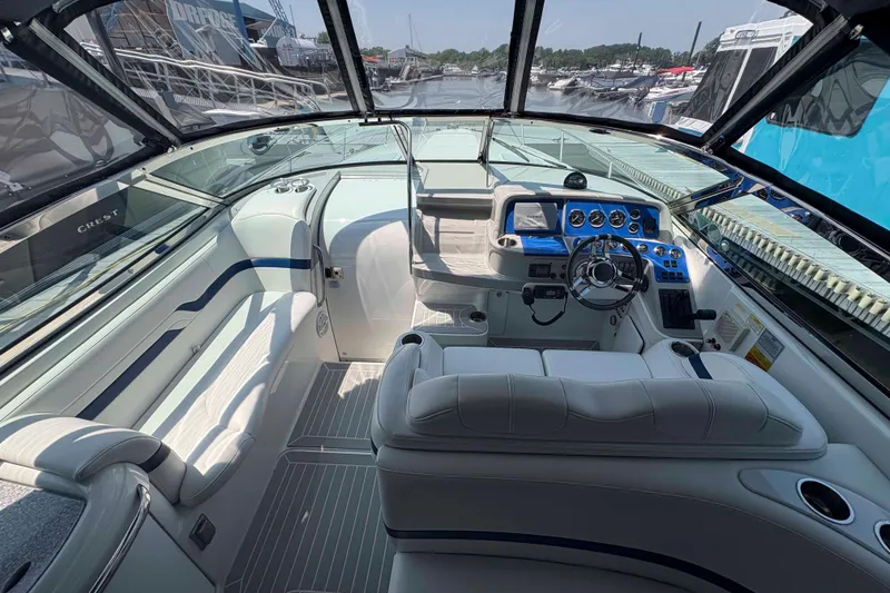 Slide: The Image of Luxurious 2007 Formula 330 Sun Sport boat interior with sleek dashboard and seating. - 4