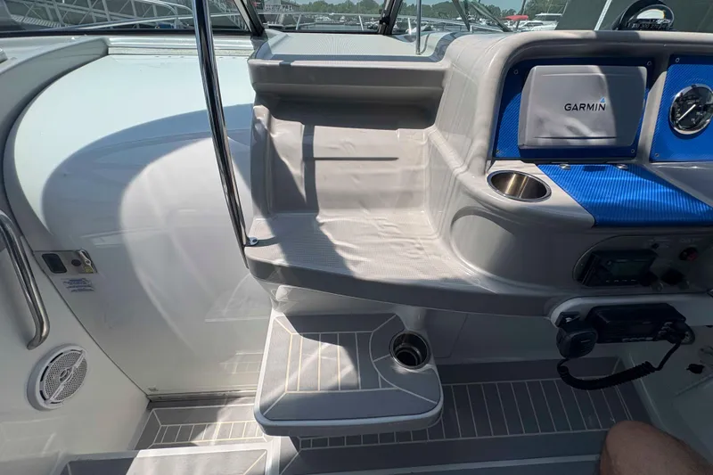 Slide: The Image of 2007 Formula 330 Sun Sport cockpit with Garmin navigation and cup holder. - 8