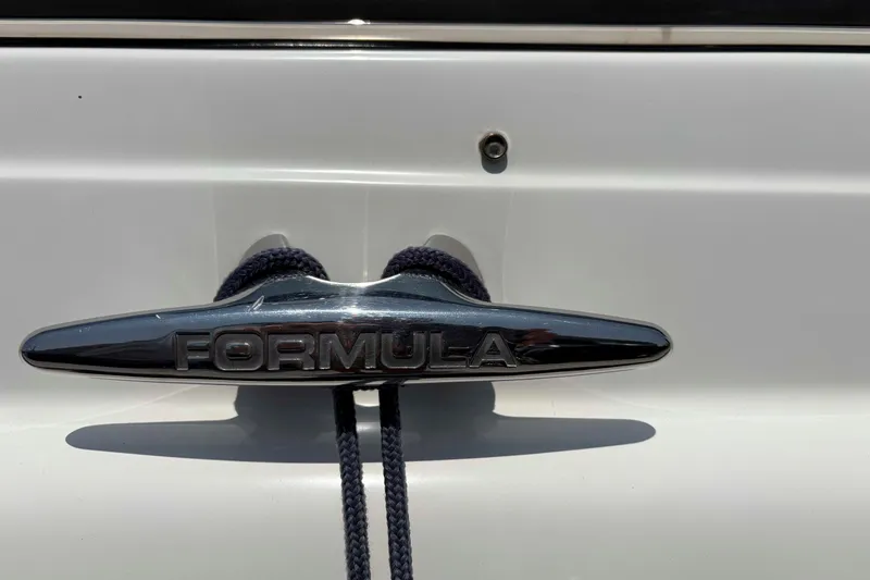 Slide: The Image of Chrome cleat on 2007 Formula 330 Sun Sport boat with rope. - 12