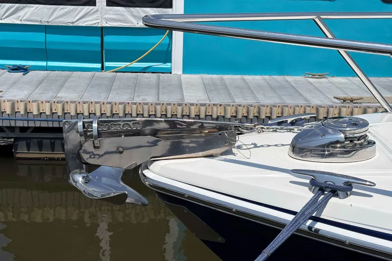 Slide: The Image of 2007 Formula 330 Sun Sport boat anchor and winch at dockside. - 11