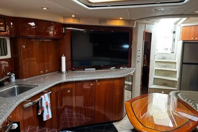 Slide: The Image of Luxurious interior of a 2003 Sea Ray 550 Sundancer yacht with modern amenities. - 20