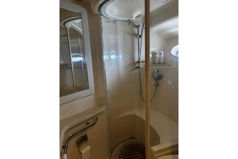 Slide: The Image of Luxurious bathroom in 2003 Sea Ray 550 Sundancer yacht with shower and mirror. - 15