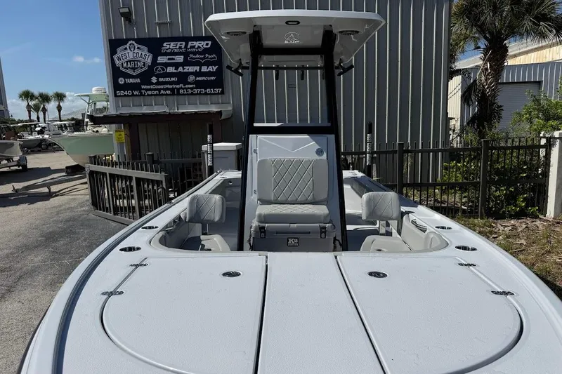 Slide: The Image of 2027 Blazer Bay 2440 boat at West Coast Marine dealership. - 3