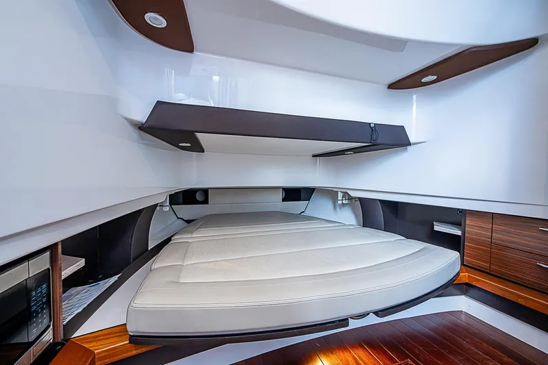 Slide: The Image of Interior cabin of 2020 Pursuit S 368 Sport boat with modern design and comfortable seating. - 43