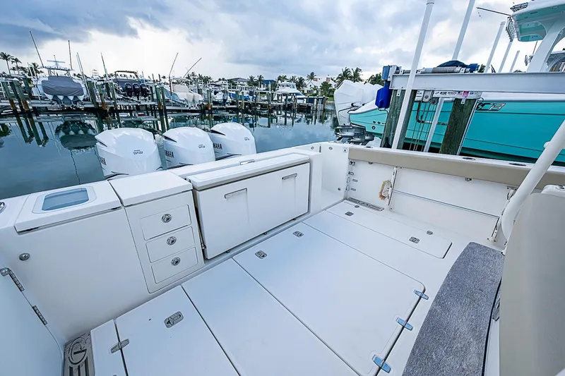 Slide: The Image of 2020 Pursuit S 368 Sport boat interior with Yamaha engines at marina. - 27