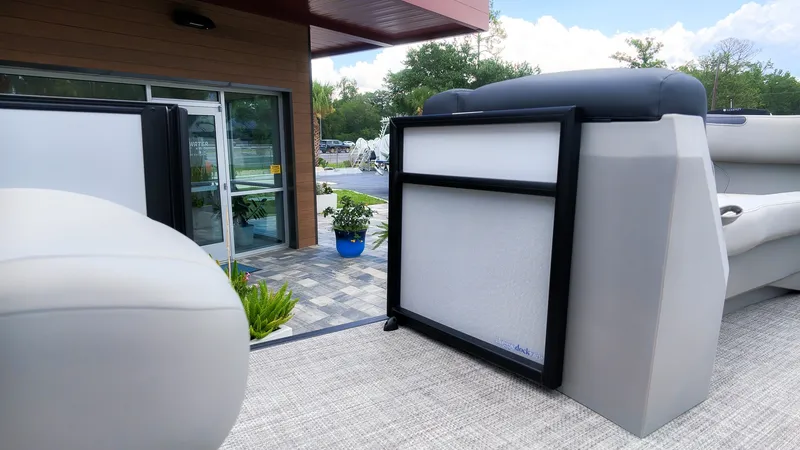 Slide: The Image of The image shows the deck of a 2026 Barletta SANZA 22UC boat with modern seating. - 15