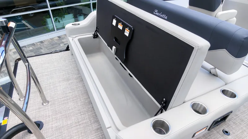 Slide: The Image of The image shows a Barletta SANZA 22UC with an open storage compartment under a cushioned seat. - 8