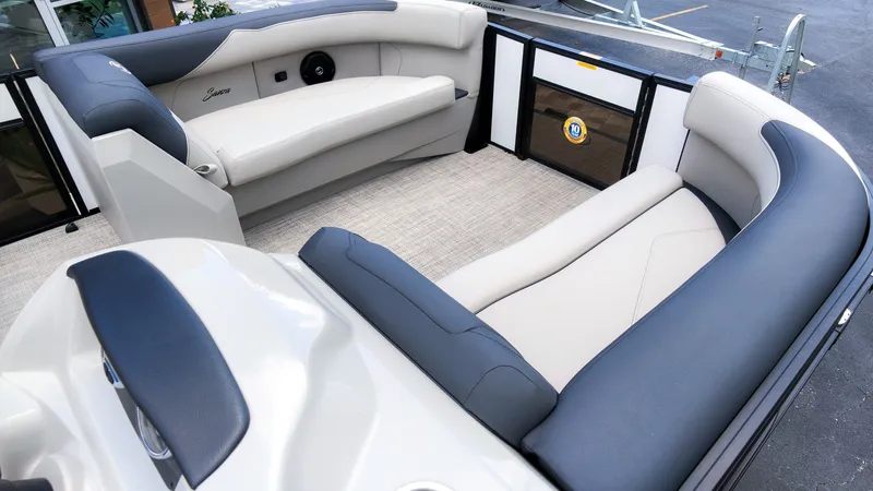 Slide: The Image of The image shows the interior of a 2026 Barletta SANZA 22UC with sleek seating. - 13