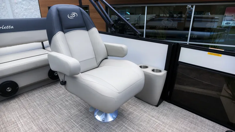 Slide: The Image of A luxurious captain's chair on a Barletta SANZA 22UC boat, surrounded by elegant details. - 10