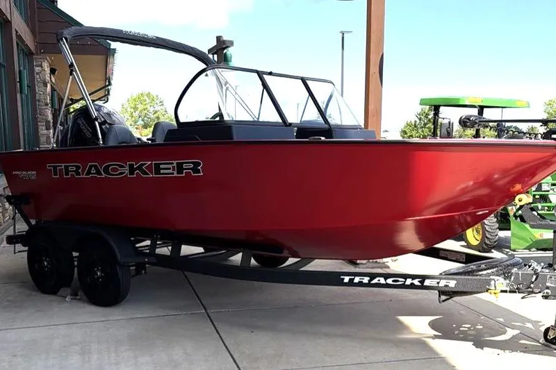 The Image of 2026 Tracker Pro Guide V-175 WT boat in vibrant red on a trailer. - 0