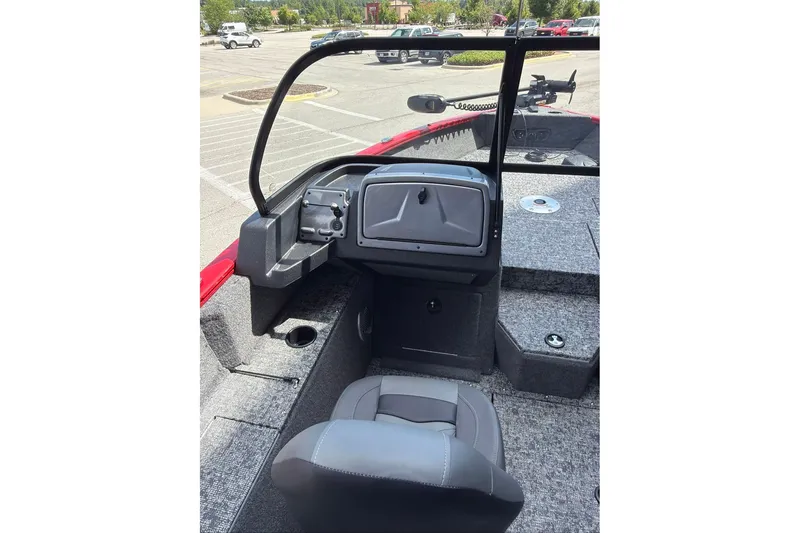 Slide: The Image of 2026 Tracker Pro Guide V-175 WT boat interior with steering console and seating. - 70