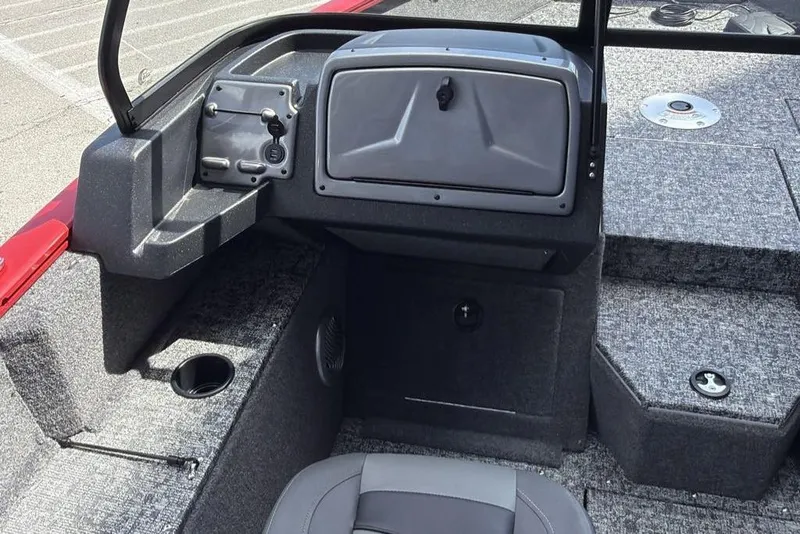 Slide: The Image of Interior of 2026 Tracker Pro Guide V-175 WT boat, featuring storage compartments and seating. - 58