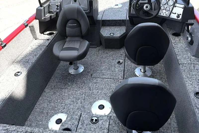 Slide: The Image of 2026 Tracker Pro Guide V-175 WT boat interior with seating and control panel. - 7