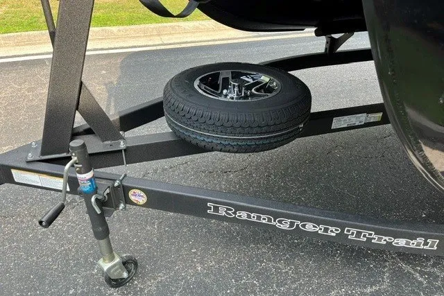 Slide: The Image of Trailer hitch and spare tire on 2026 Ranger 220FC boat trailer. - 15