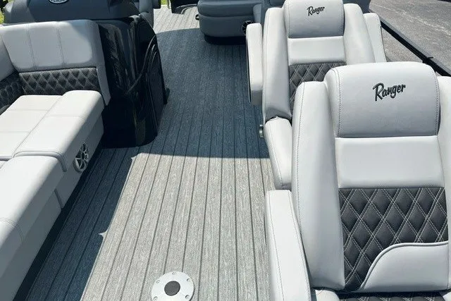 Slide: The Image of 2026 Ranger 220FC boat interior with luxurious seating and stylish design. - 13