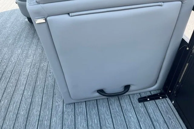 Slide: The Image of Gray seat on 2026 Ranger 220FC boat with textured flooring. - 10