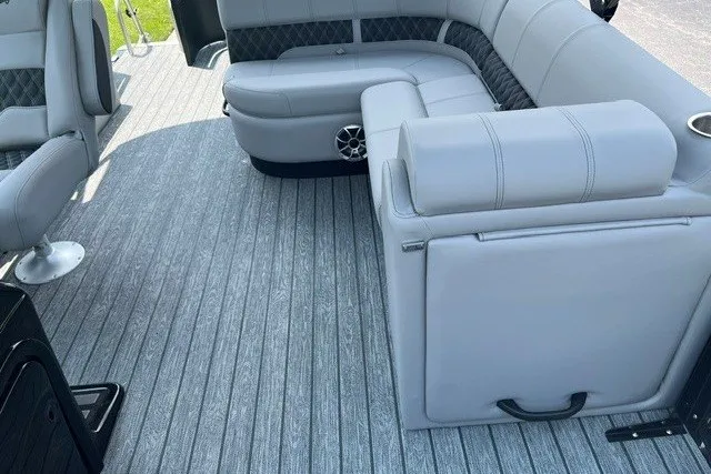 Slide: The Image of Luxurious interior of 2026 Ranger 220FC boat with sleek gray seating and flooring. - 14
