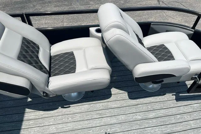 Slide: The Image of Luxury seating on 2026 Ranger 220FC boat with stylish upholstery and modern design. - 12