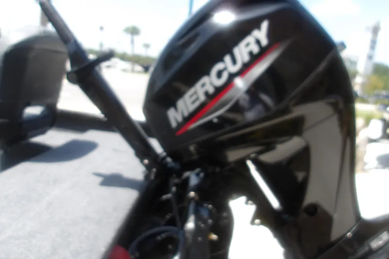 Slide: The Image of Blurry image of a Mercury outboard motor on a 2026 Tracker Super Guide V-16 T boat. - 8
