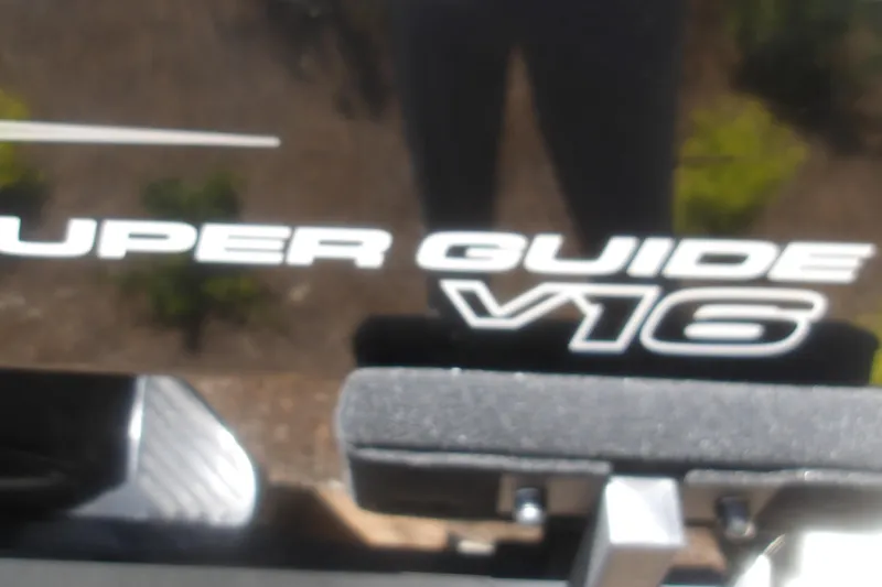 Slide: The Image of Close-up of 2026 Tracker Super Guide V-16 T logo on a boat. - 10