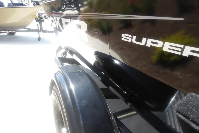 Slide: The Image of 2026 Tracker Super Guide V-16 T boat on trailer, close-up view. - 11