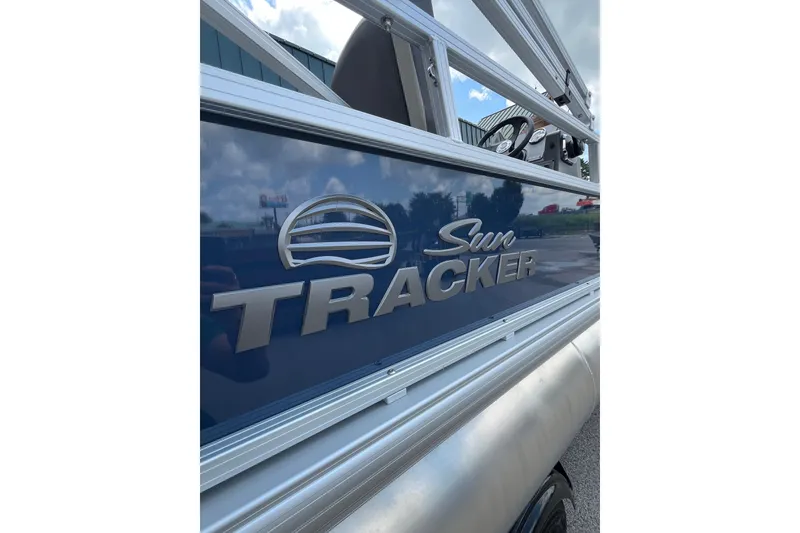Slide: The Image of 2026 Sun Tracker Bass Buggy 16 XL Select pontoon boat side view. - 6