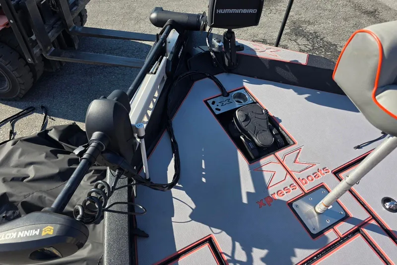 Slide: The Image of 2023 Xpress H17 boat deck with Minn Kota trolling motor and Humminbird electronics. - 19