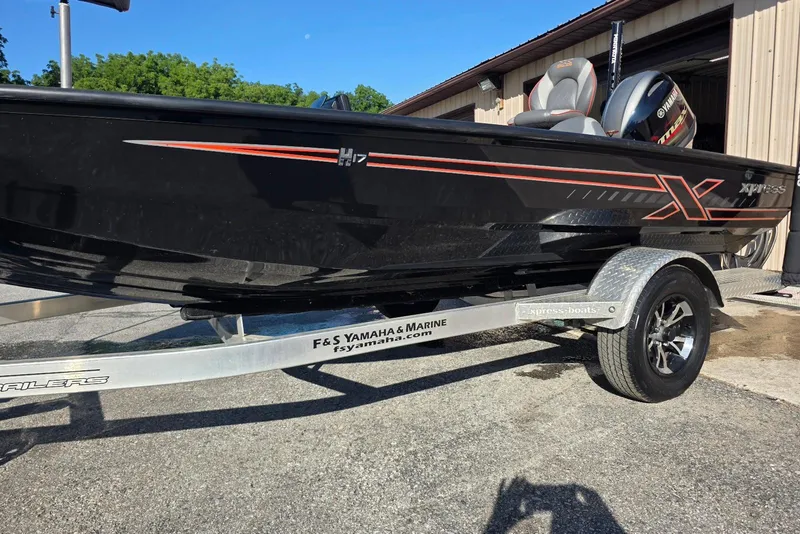 Slide: The Image of 2023 Xpress H17 boat on trailer at F&S Yamaha & Marine dealership. - 9