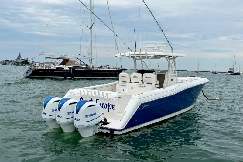 Slide: The Image of 2017 Stamas 390 Tarpon boat with triple Yamaha engines on the water. - 17