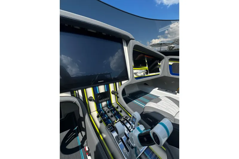 Slide: The Image of Interior of 2022 MTI 48 boat featuring advanced controls and sleek design elements. - 3