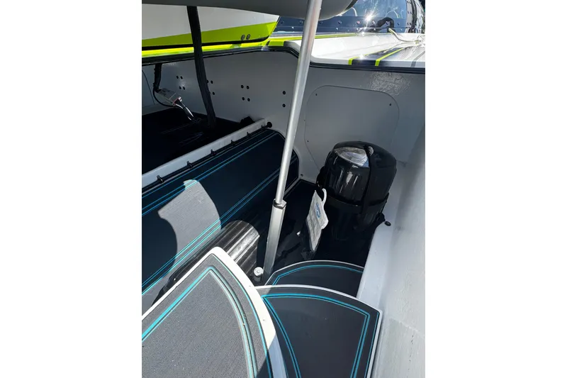Slide: The Image of Interior of 2022 MTI 48 boat, featuring sleek seating and modern design elements. - 18