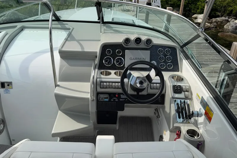 Slide: The Image of Cockpit of 2009 Formula 310 Sun Sport boat with Garmin navigation system and sleek controls. - 7