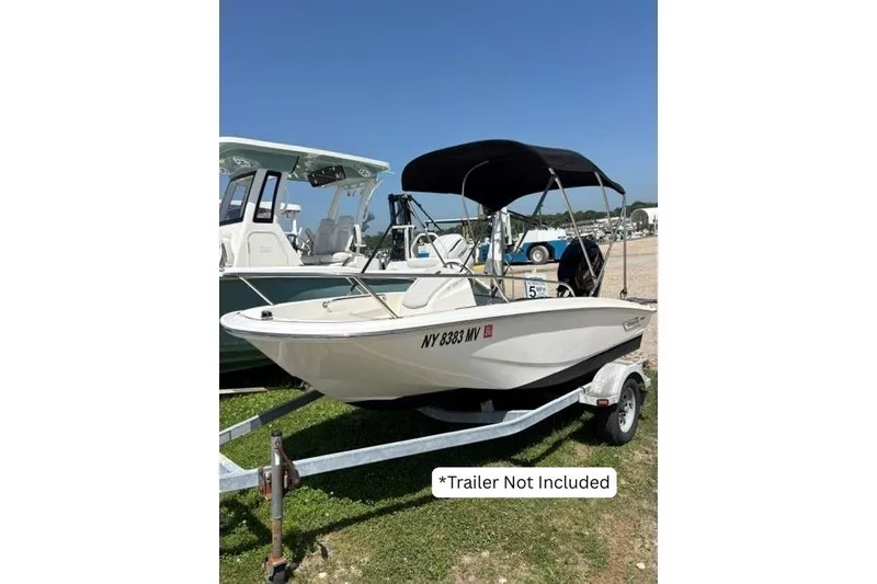 The Image of 2024 Boston Whaler 130 Super Sport boat on display, trailer not included. - 0