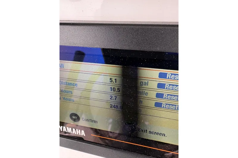 Slide: The Image of Display screen of a 2019 Regulator 23 Forward Seating boat showing trip data. - 18