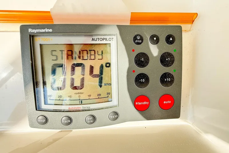 Slide: The Image of Raymarine autopilot display on 2004 Silverton 48 Convertible, showing standby mode. - 13