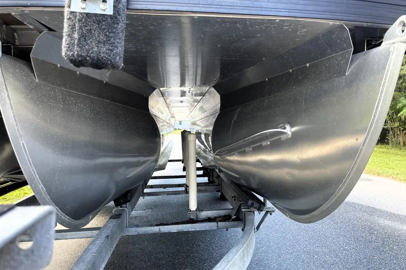 Slide: The Image of Underneath view of 2022 Barletta Cabrio 22QC pontoon boat on trailer. - 9