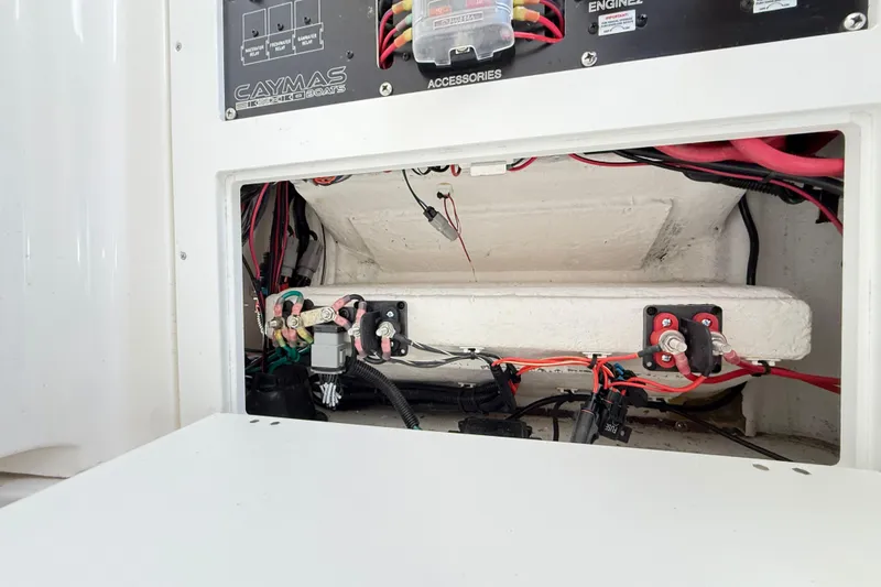 Slide: The Image of 2023 Caymas 281 HB boat electrical panel with wiring and components. - 57