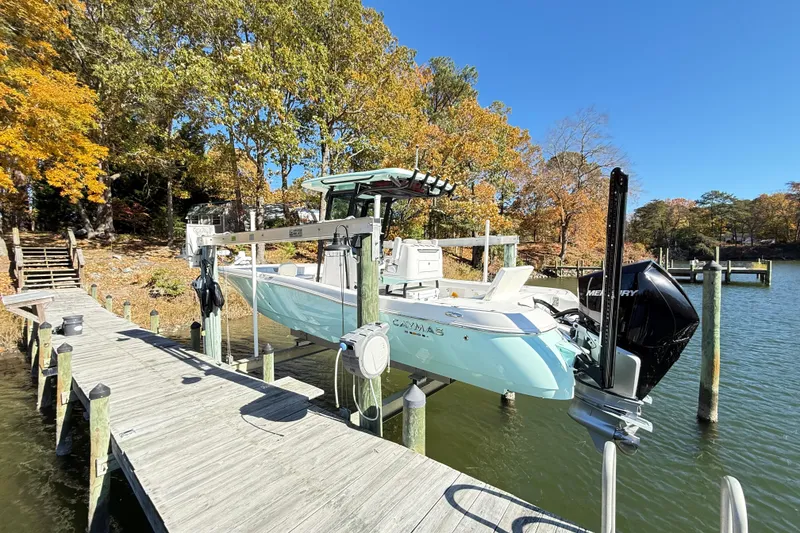 Slide: The Image of 2023 Caymas 281 HB boat docked on a sunny autumn day by the lake. - 7