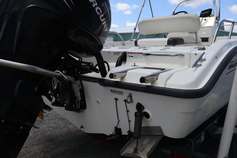 Slide: The Image of 2007 Boston Whaler 180 Dauntless boat with Mercury outboard motor, rear view. - 17