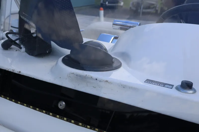 Slide: The Image of Console of a 2007 Boston Whaler 180 Dauntless boat with navigation equipment. - 59