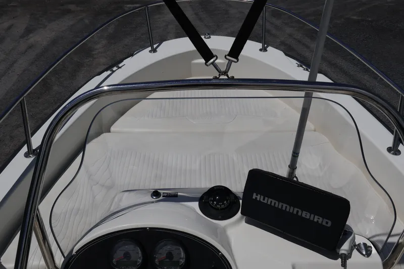 Slide: The Image of 2007 Boston Whaler 180 Dauntless boat interior with Humminbird navigation system. - 28