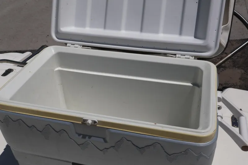 Slide: The Image of Open cooler on a 2007 Boston Whaler 180 Dauntless boat deck. - 42