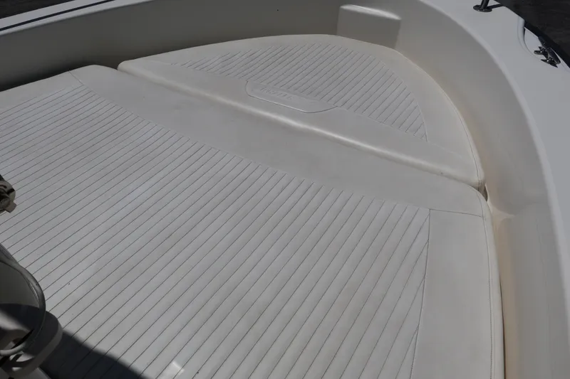 Slide: The Image of 2007 Boston Whaler 180 Dauntless boat deck with textured white surface. - 30