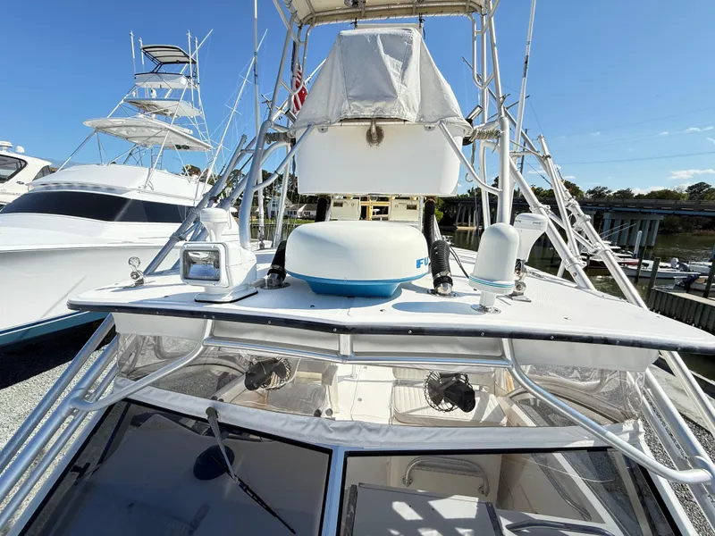 Slide: The Image of 2001 Albemarle 280 Express Sport Fisherman boat with diesel power, docked at a marina. - 17