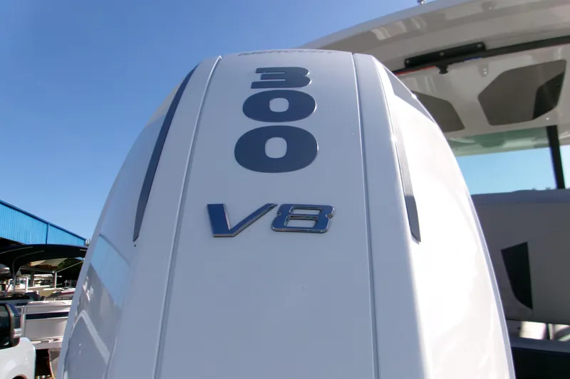 Slide: The Image of Close-up of 300 V8 engine on 2026 Monterey Elite 25 SD boat. - 2