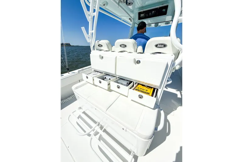 Slide: The Image of 2022 Onslow Bay 41 Tournament boat with open storage drawers and seating. - 16