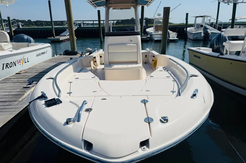 Slide: The Image of 2021 Grady-White 251 Coastal Explorer boat docked at marina. - 3