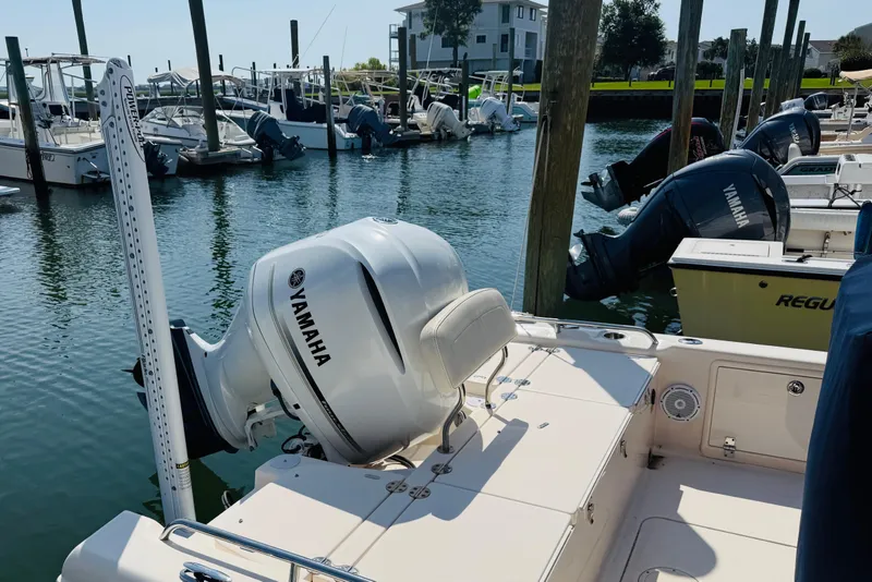 Slide: The Image of 2021 Grady-White 251 Coastal Explorer with Yamaha outboard at marina dock. - 5